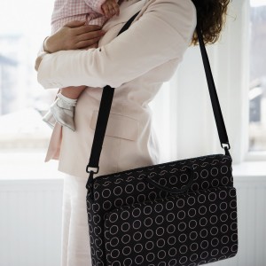 Businesswoman Holding a Baby